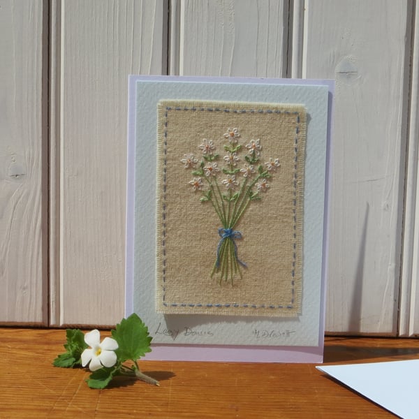 Lazy Daisies hand embroidered card with finely worked daisies and bow
