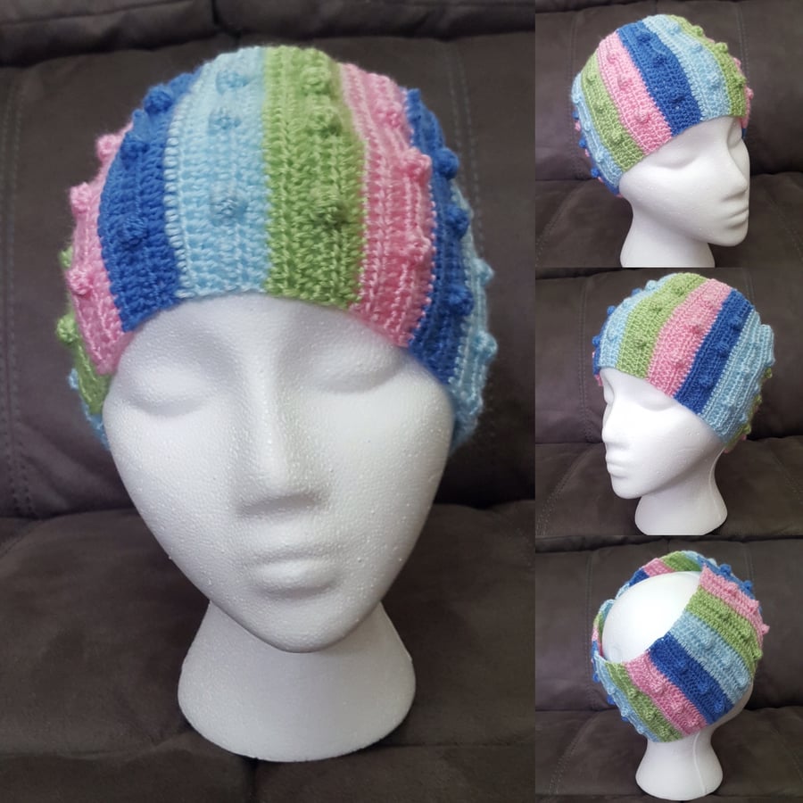 Multicoloured striped with cluster style women’s ear warmer headband.