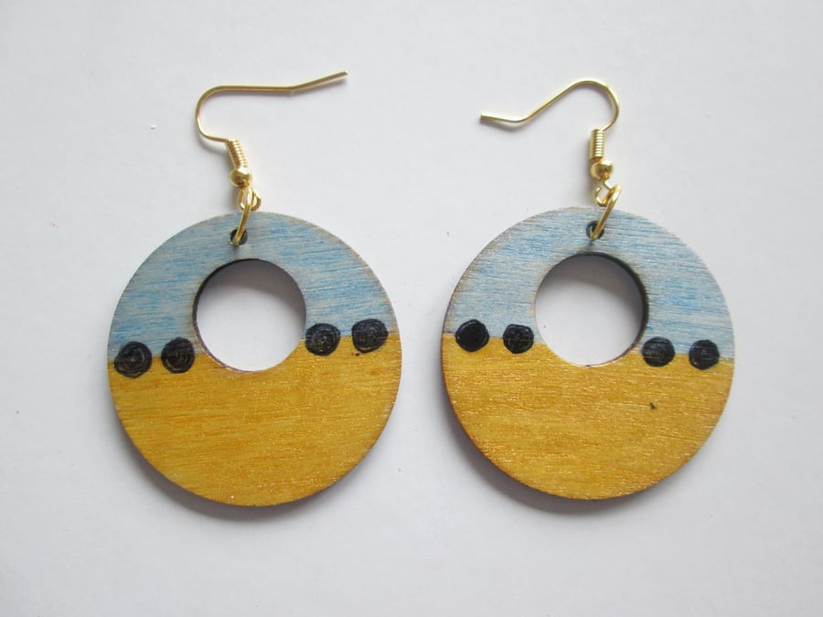Wooden hand painted circle dangle earring. 