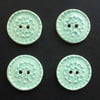 set of four large pale blue glazed ceramic buttons 