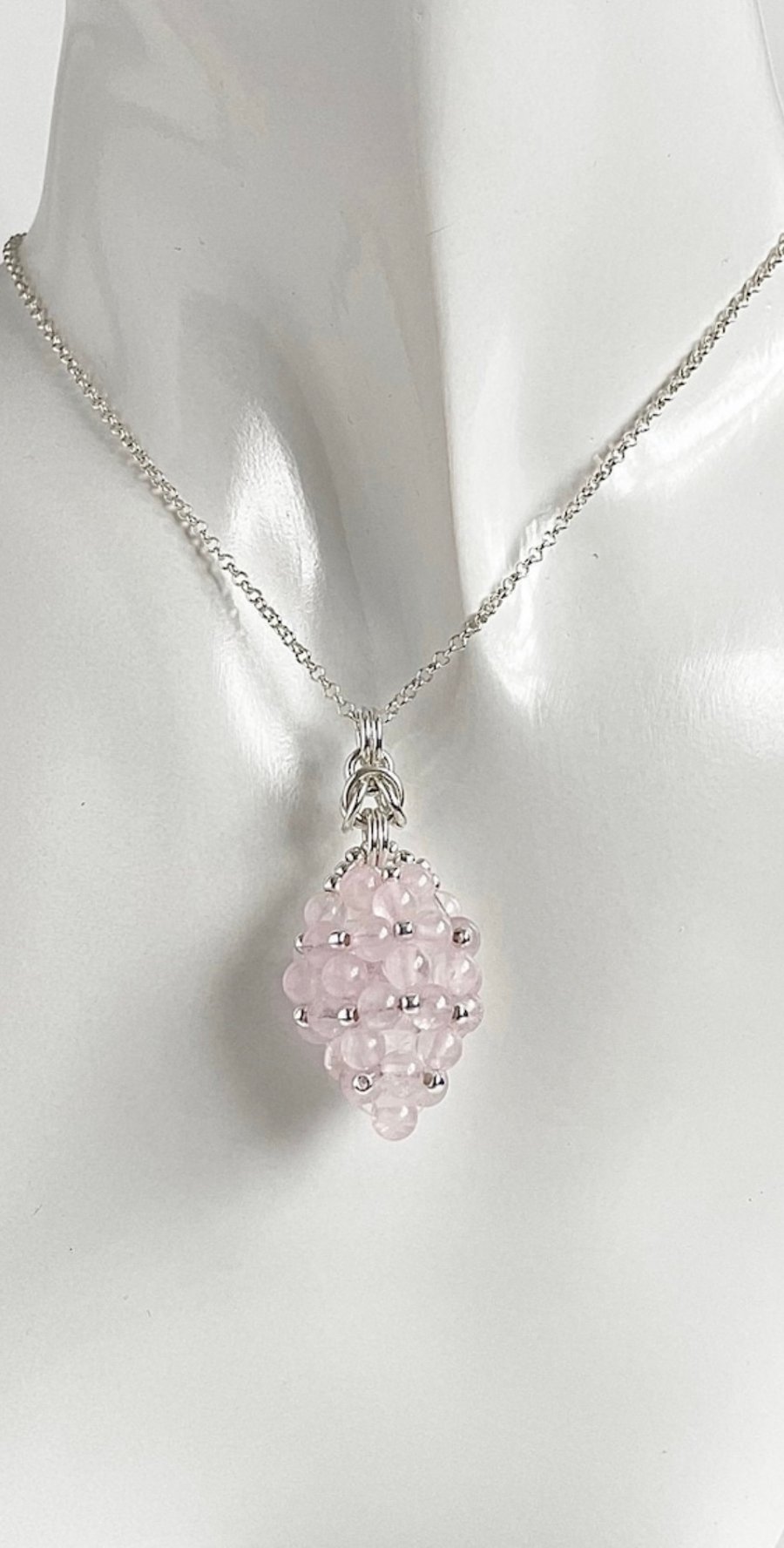 Sterling Silver Rose Quartz Egg Shaped Pendant, with an 18 Inch Chain