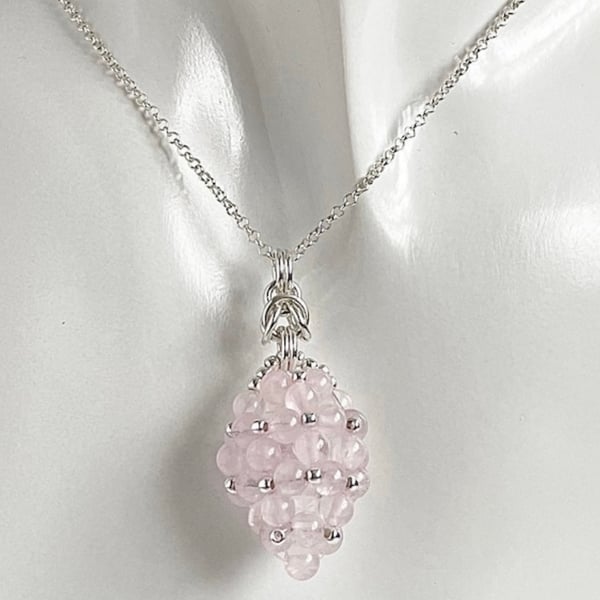 Sterling Silver Rose Quartz Egg Shaped Pendant, with an 18 Inch Chain