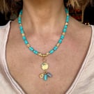 Gorgeous boho turquoise and gold charm necklace
