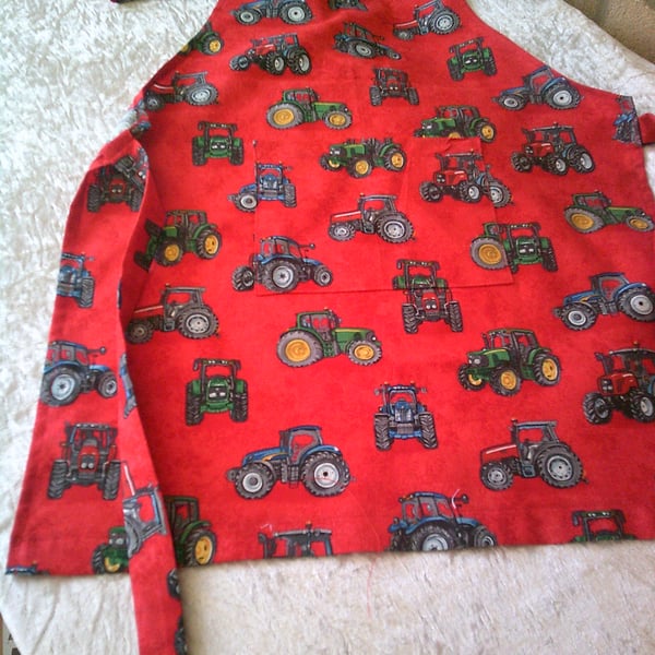 Tractors on Red Child's Apron
