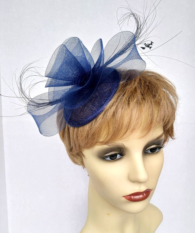 Navy blue fascinator with 'crin' ruffle and feathers 