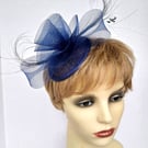 Navy blue fascinator with 'crin' ruffle and feathers 