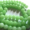 40 green glass beads 8mm