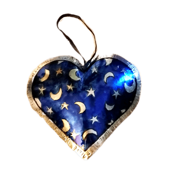 Handmade Blue Metal Heart Decoration with Moons and Stars pattern.