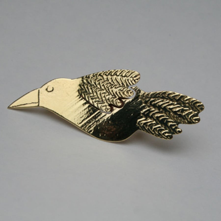 flying bird brooch