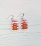 Pink and white striped gingerbread men earrings - Image 3