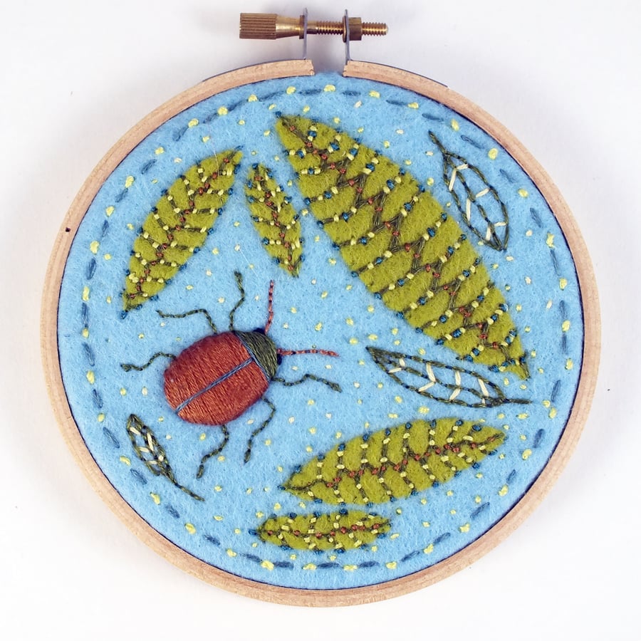 Embroidery Hoop  applique and embroidery on felt, beetle and leaves