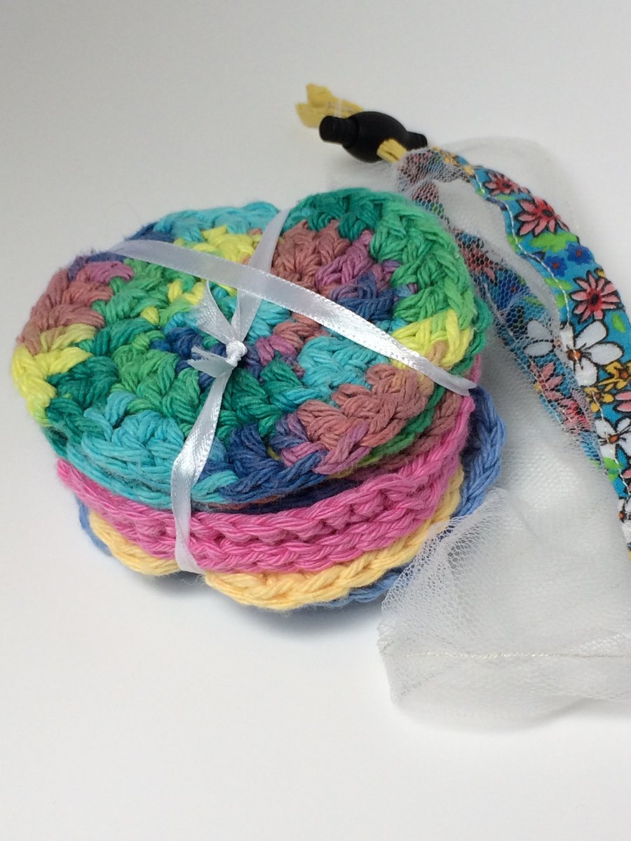 Eight reusable crochet cotton face and make up wipes with net washbag.