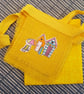 Beach hut bunting on hessian: yellow
