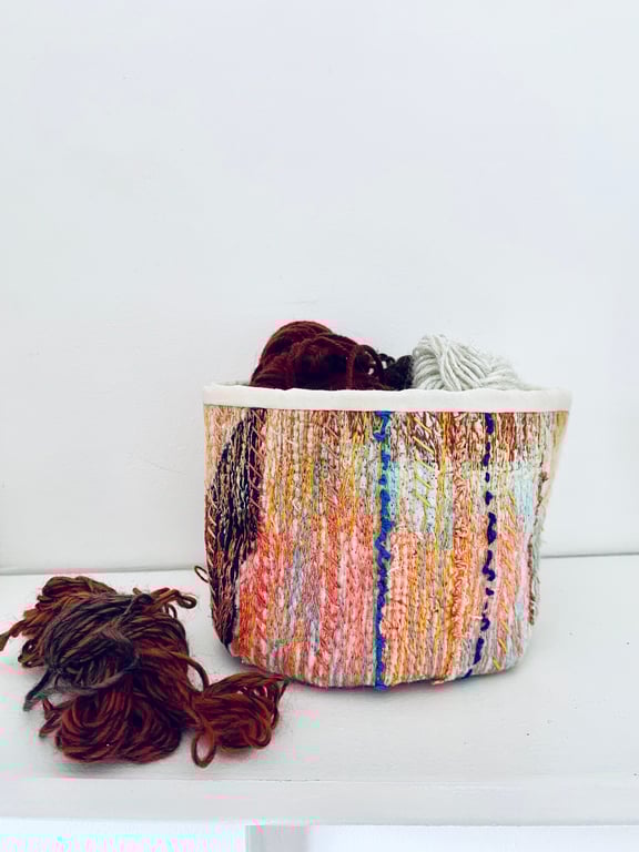 Colourful textile storage basket or pot plant holder