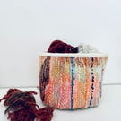 Colourful textile storage basket or pot plant holder