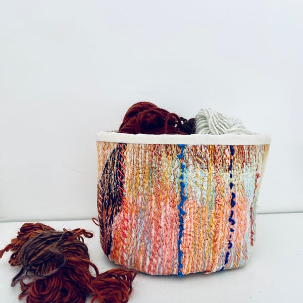 Colourful textile storage basket or pot plant holder