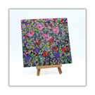 A colourful, acrylic painting - flowers - wildflowers - with easel