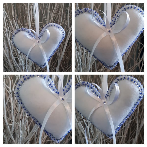 Heart hangers in white felt with silver sequins and blue beads.