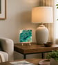 Easel mounted acrylic painted canvas in greens and blues - Image 1