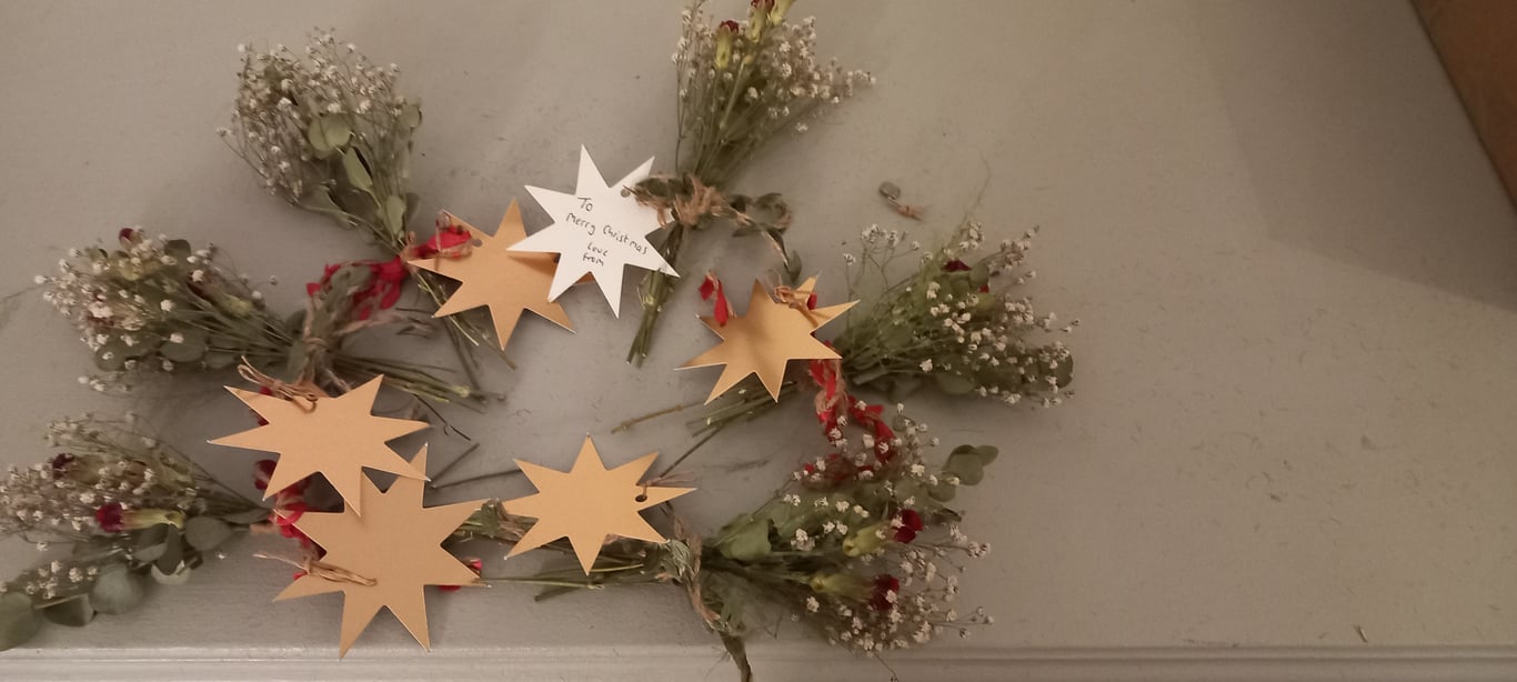 Mini festive dried flower bouquet with Christmas gift tag