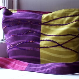 Soft textile zip fastening shoulder bag in purple, yellow and pink