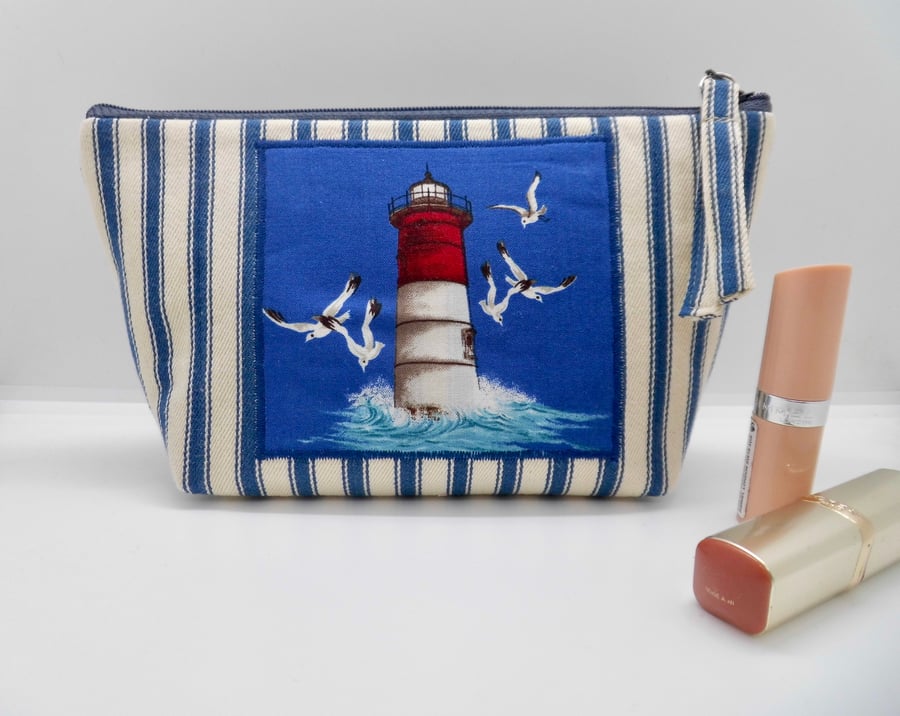 Make up bag with light house appliqué blue and white striped