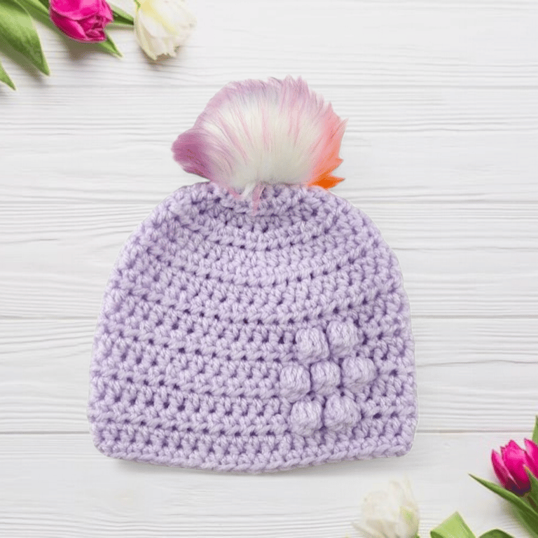 Lilac baby crocheted hat white faux fur pompom with orange purple & pink 