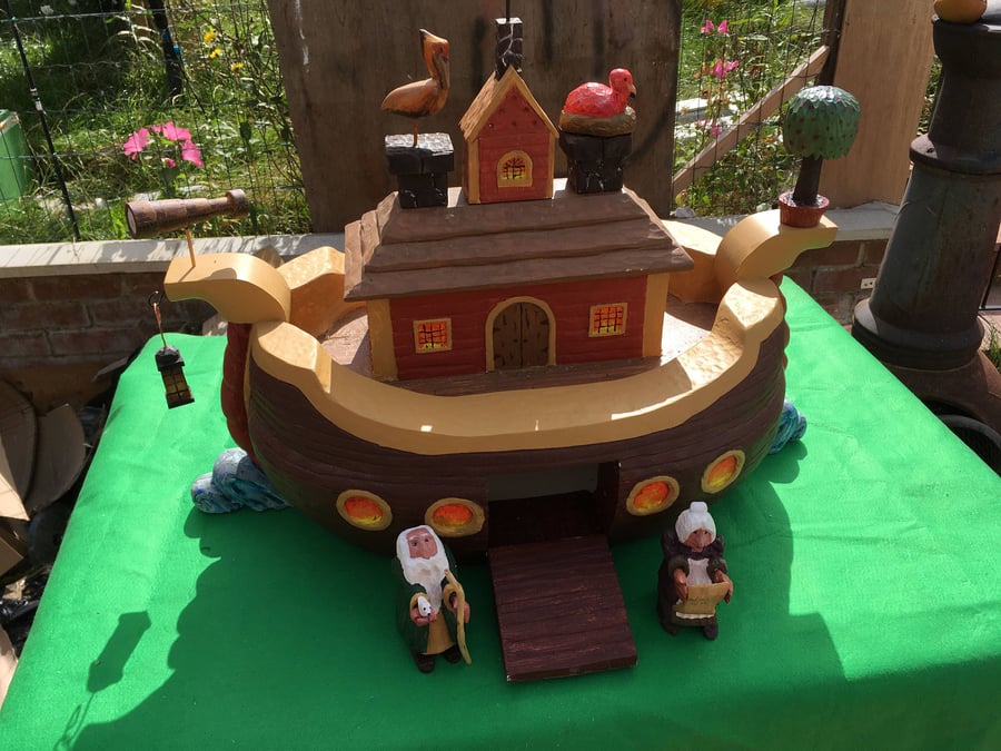 A Hand Carved and Hand Painted Model of Noah's Ark with Various Figures and Anim