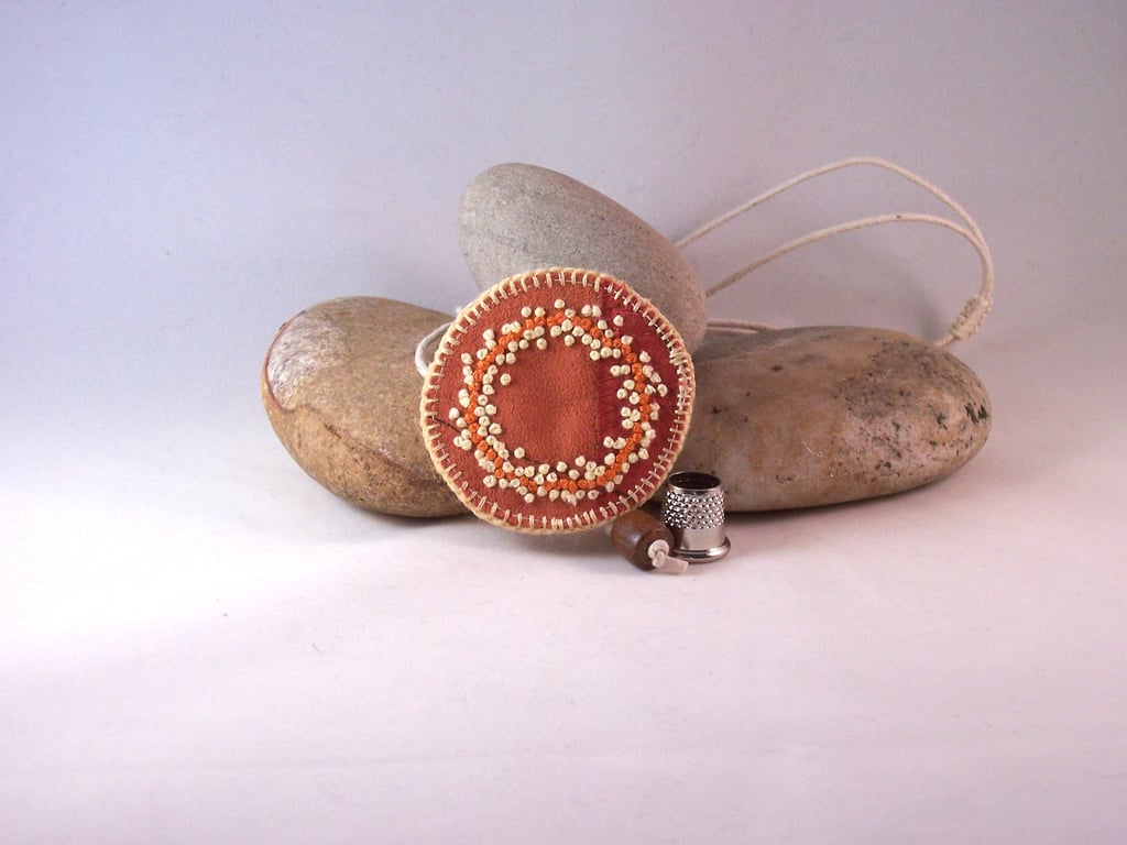 Fabric necklace with hand embroidered french knots