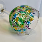 Hand painted floral design on wine glass