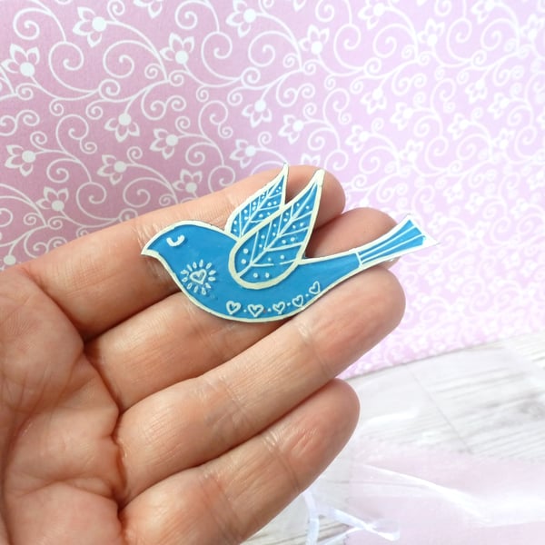 Royal blue folk art bird brooch. Blue hand-drawn jacket pin