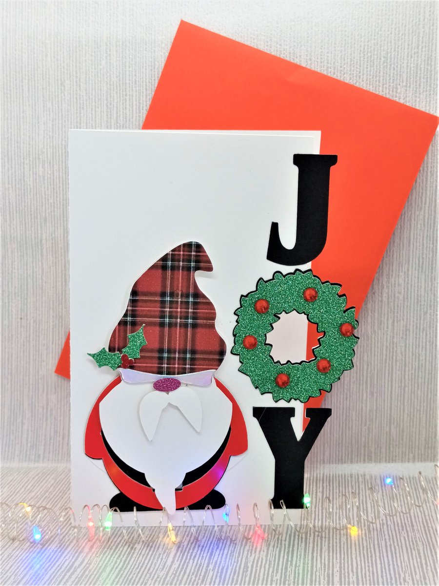 Cute cut out Christmas Gnome with the word joy
