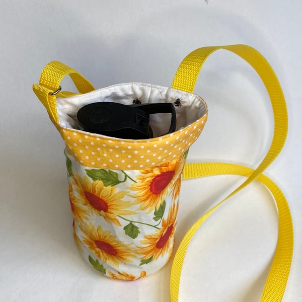 Water bottle carrier with pocket for phone. Sunflowers and bees