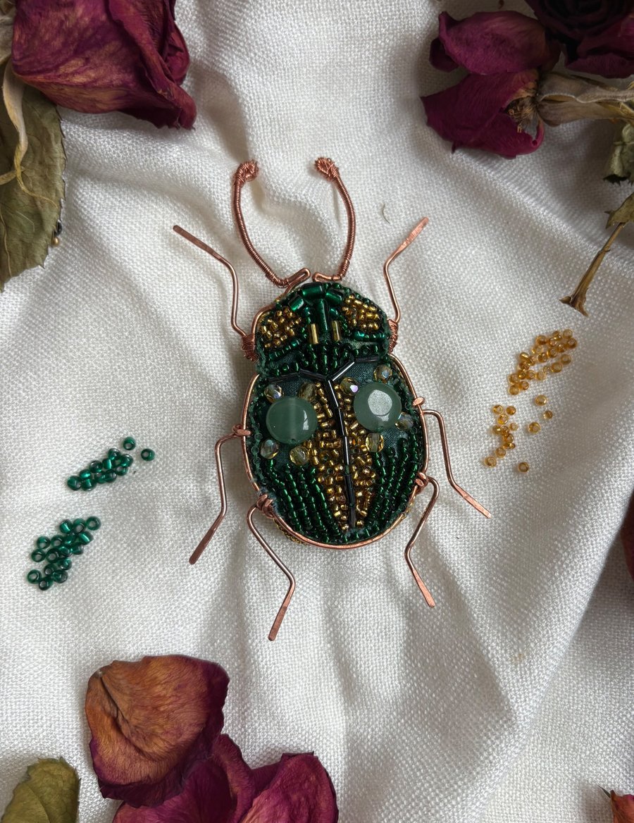 Charming copper with green and gold beaded brooch