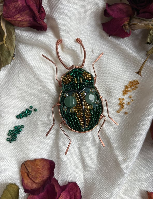 Charming copper with green and gold beaded brooch