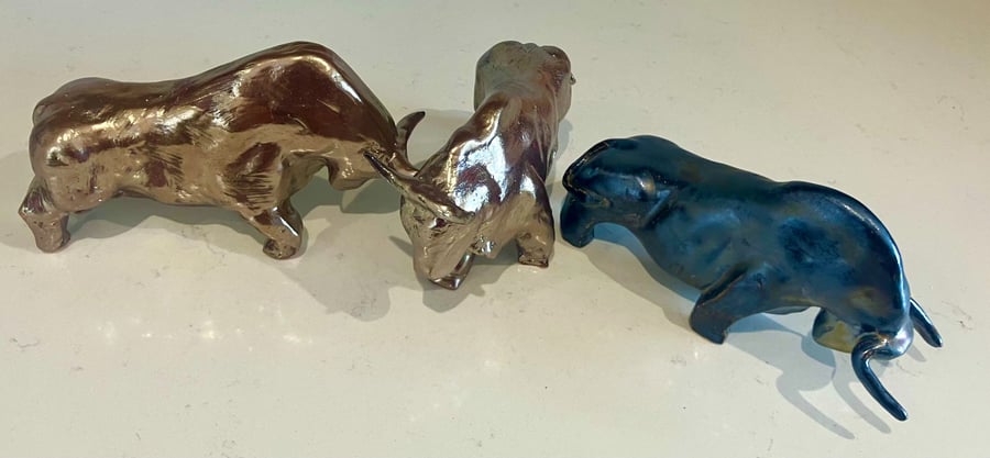 Bold ceramic bull sculpture with a modernist form. 21cm x 12cm x 6cm