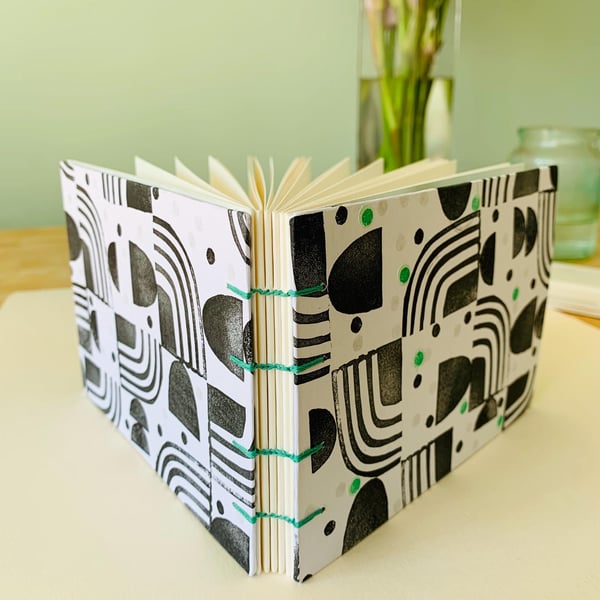 A6 Mixed Media Sketchbook with Unique, Hand-printed Covers and Coptic Binding.