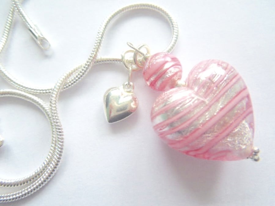  Murano glass pink and silver heart pendant with sterling silver charm.