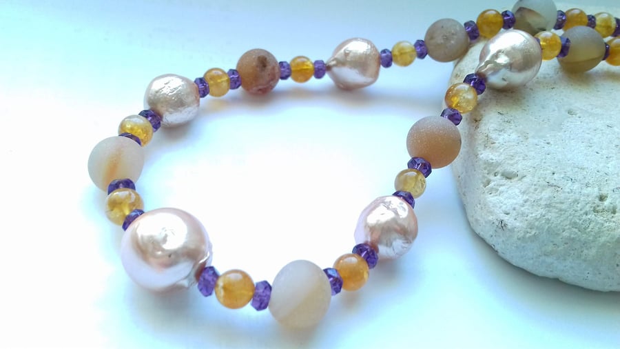 Gold Electroplated Freshwater Pearls and Amethyst colour theory necklace.