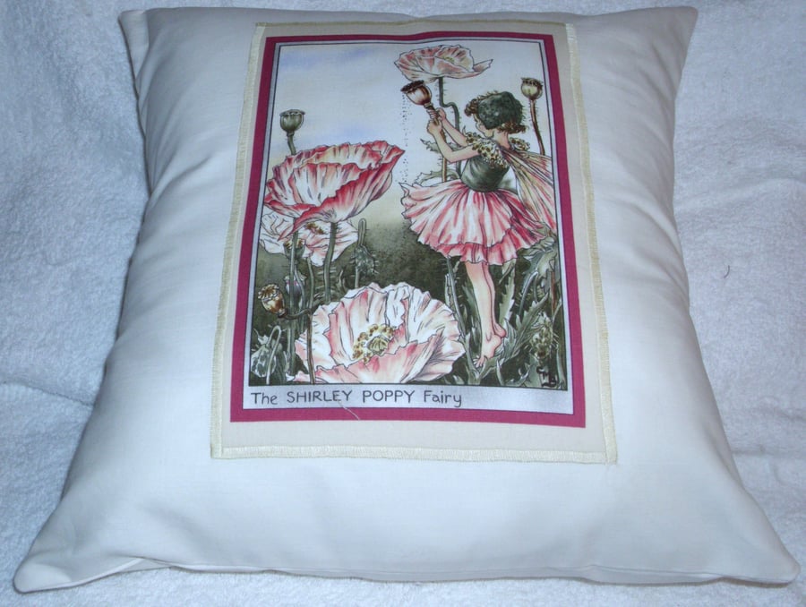 The Shirley Poppy Fairy cushion