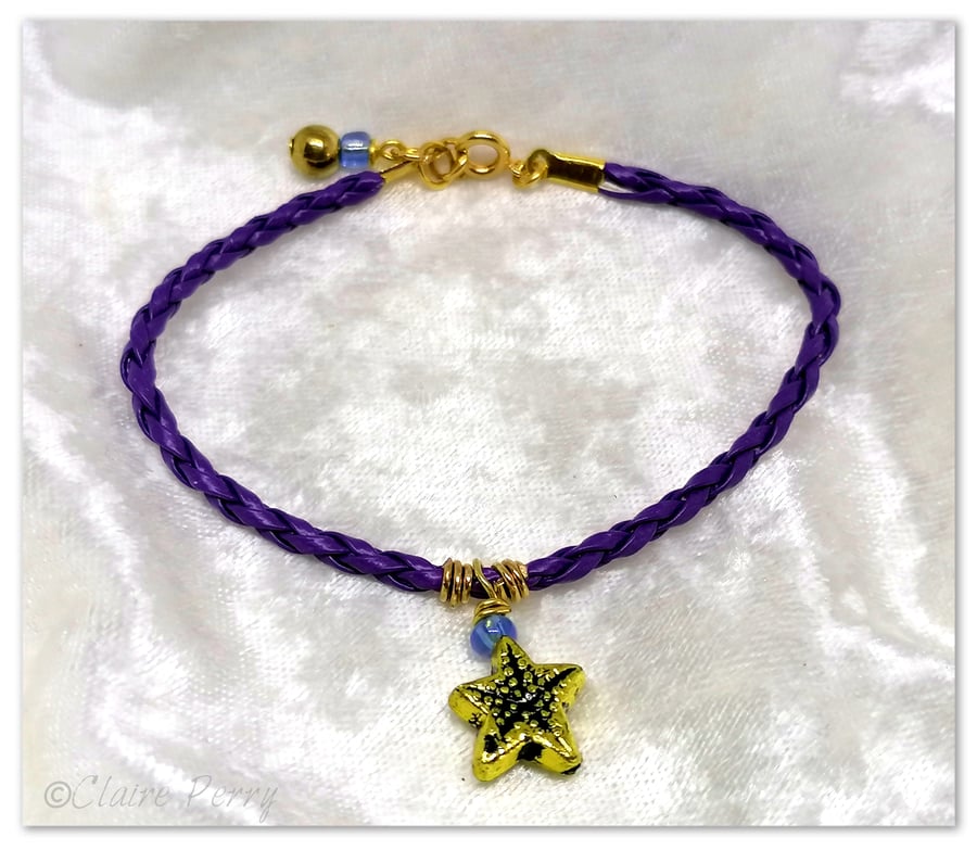 Bracelet Purple Faux Leather with gold plated Starfish charm bead.