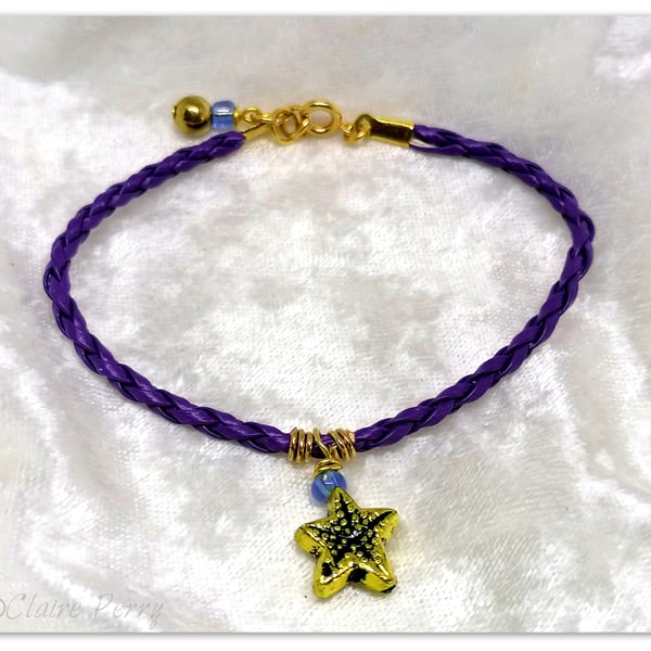 Bracelet Purple Faux Leather with gold plated Starfish charm bead.