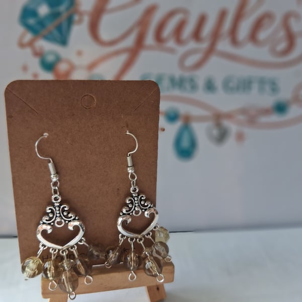 Green and silver dangle earrings