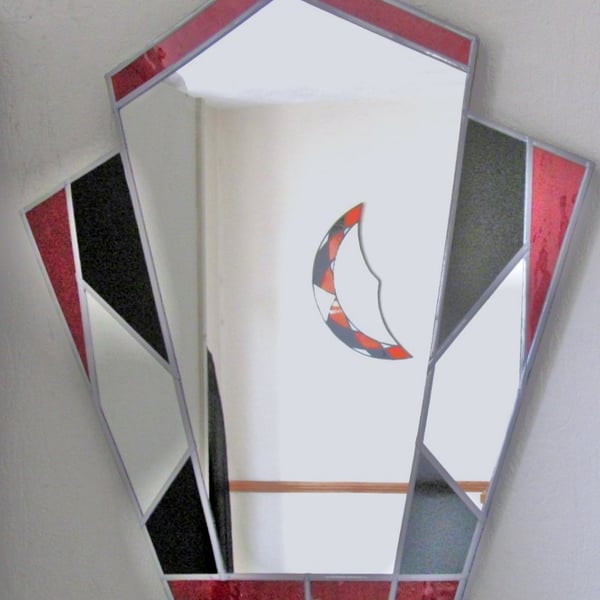 Art Deco style colored mirror .Ideal for all situations.
