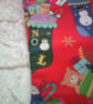 Christmas Stocking with stockings full of Gifts on a red background  - Image 3