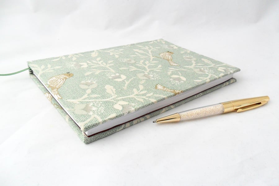 Handmade notebook with a bird print cover