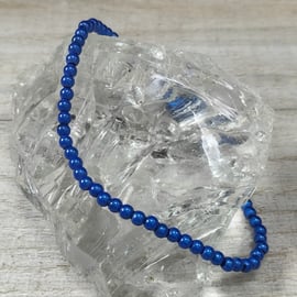 AL95b  Blue miracle bead elasticated anklet, 10.5"