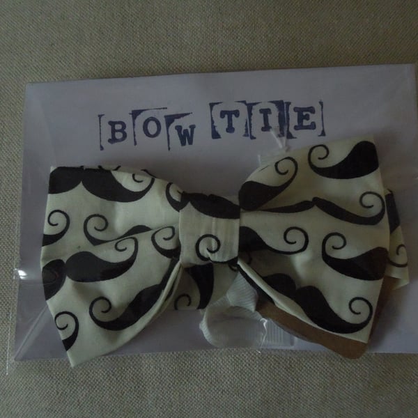 Black Mo on Cream bowtie; 13inch neck 