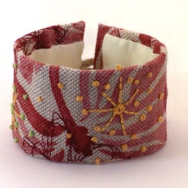 Printed linen hand embroidered cuff with yellow hand embroidery