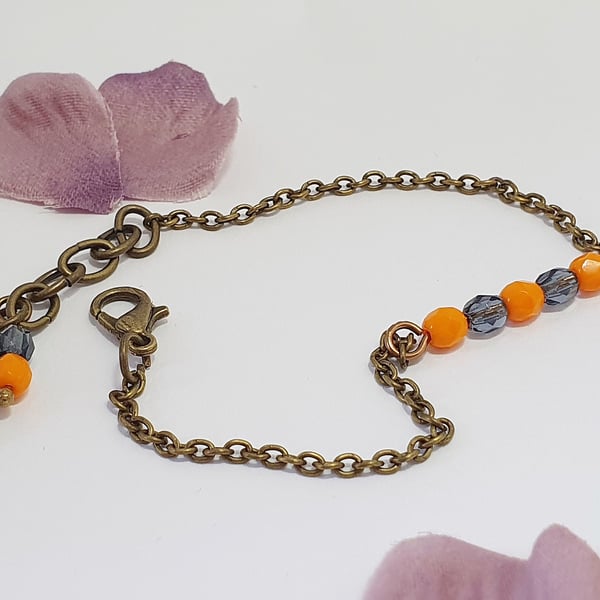 Dainty orange and blue Czech glass boho bead bracelet